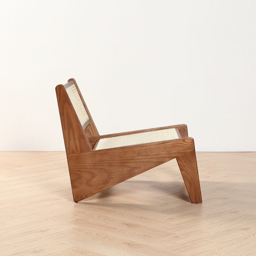 Decrescendo handmade rattan armchair