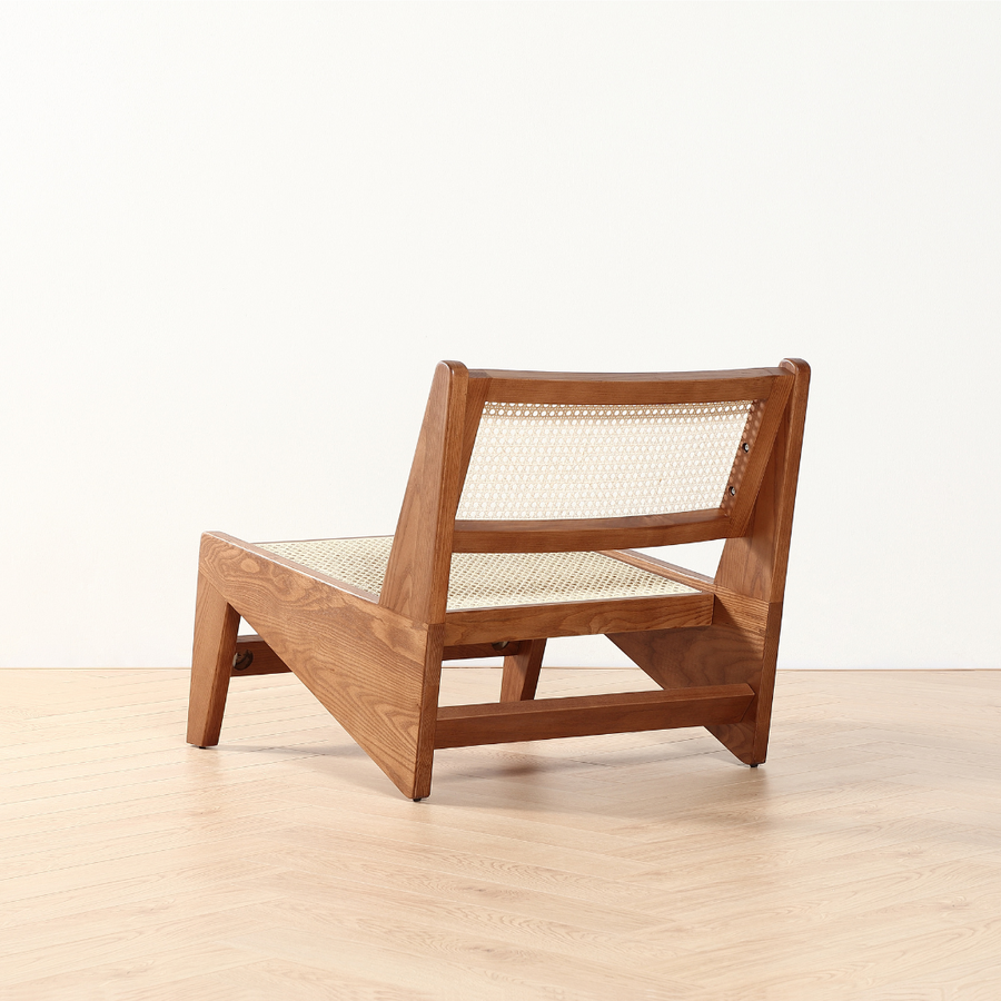 Decrescendo handmade rattan armchair